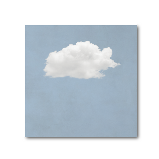 Minimalist cloud wall art print with serene blue sky background, calming modern home decor