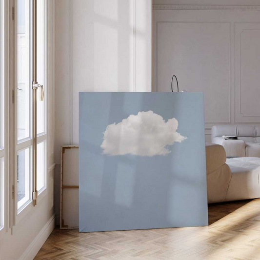 Minimalist cloud wall art print with serene blue sky background, calming modern home decor